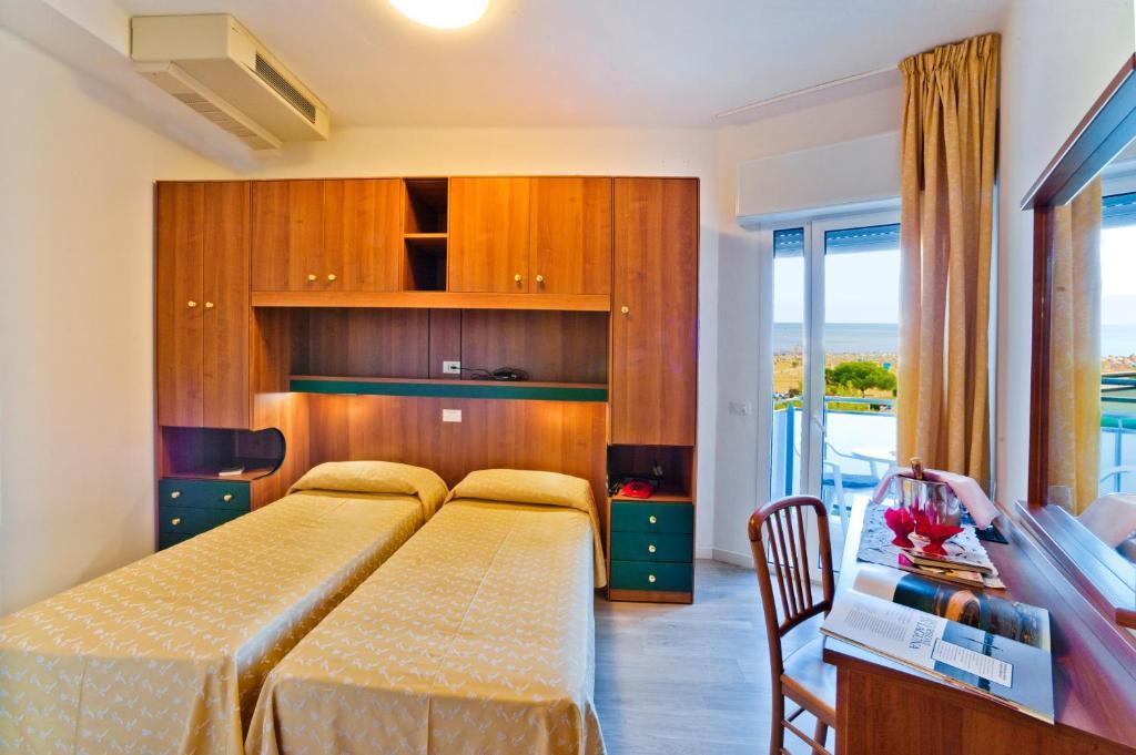 Hotel Gimm Бибионе Стая снимка