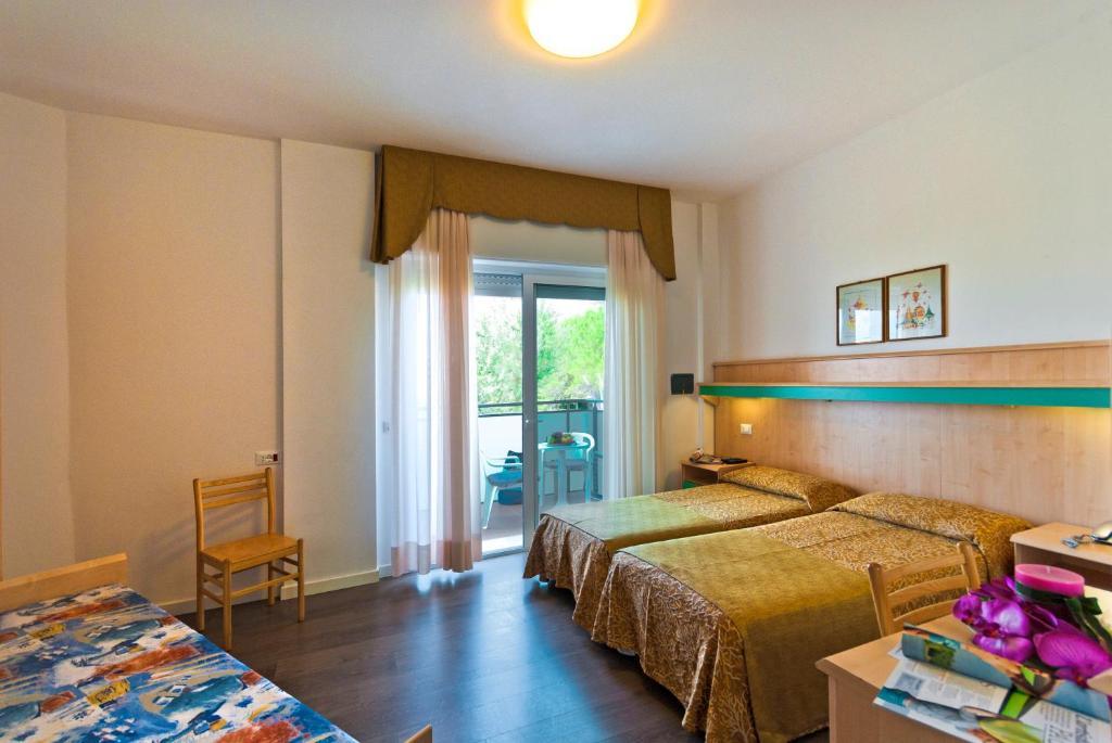 Hotel Gimm Бибионе Стая снимка